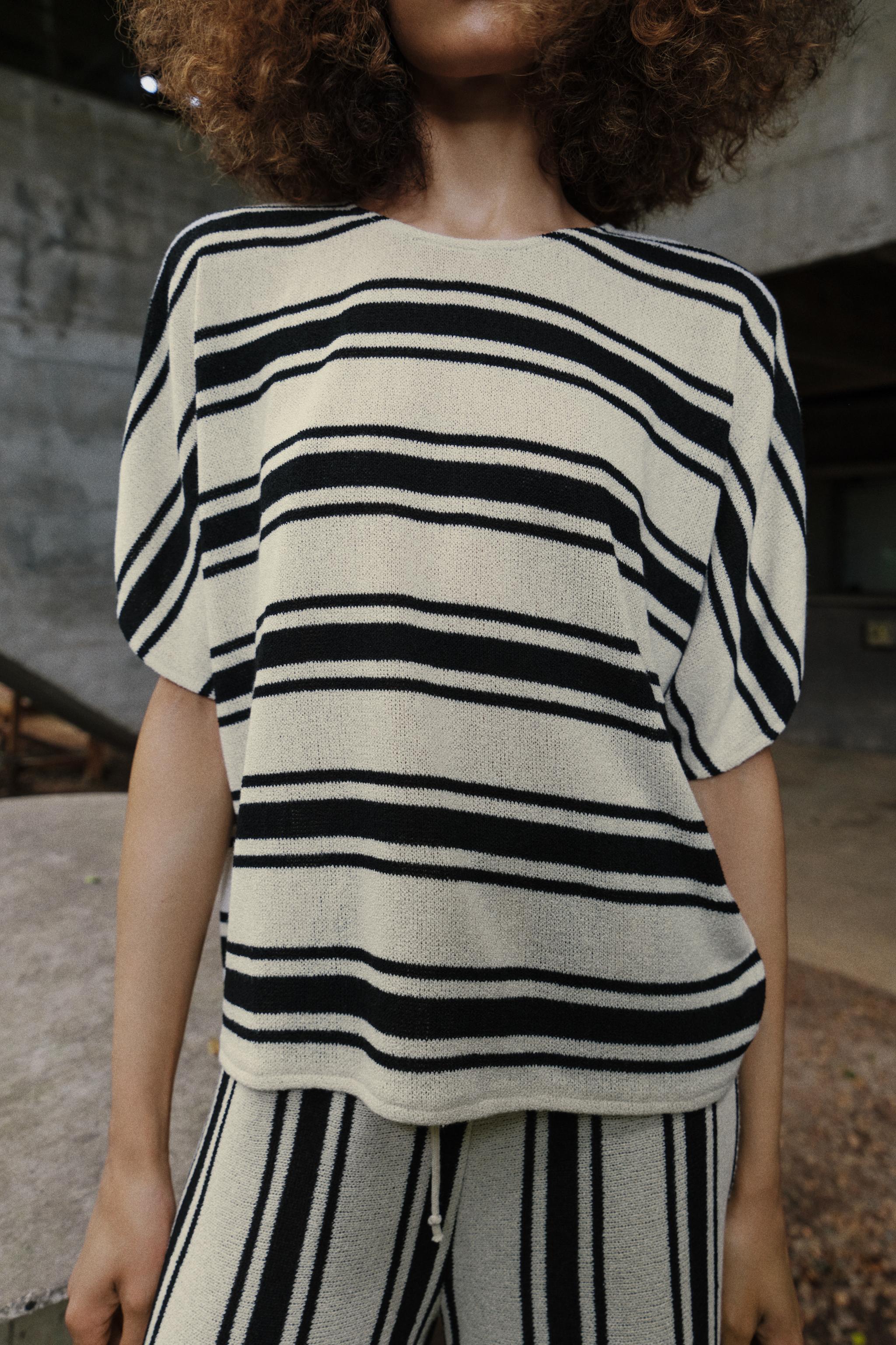 RUSTIC CAPE SLEEVE TOP